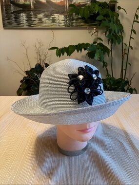 Elegant Metallic Silver Women's Hat with Black Crystal Floral Accent